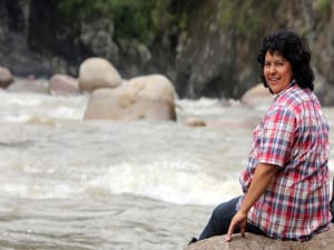 Berta Caceres stands at the Gualcarque River in the Rio Blanco region of western Honduras where she, COPINH (the Council of Popular and Indigenous Organizations of Honduras) and the people of Rio Blanco have maintained a two year struggle to halt construction on the Agua Zarca Hydroelectric project, that poses grave threats to local environment, river and indigenous Lenca people from the region.