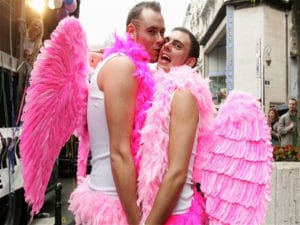 Men in angel costumes pose during "Gays and Lesbians Pride" rally in central Brussels...Men in angel costumes pose during the traditional "Gays and Lesbians Pride" rally in central Brussels May 27, 2006.     REUTERS/Francois Lenoir